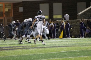 Senior Dylan Bedard plays in a game against North Kansas City on Sept. 10. Bedard started kicking for the football team on Sept. 10 against Liberty North High School as well as being a varsity soccer player. “I like being on both,” said Bedard. “I go from soccer practice to football practice everyday.” 