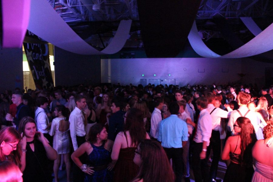 At+the+Homecoming+dance+Sept.+23%2C+more+than+700+student+showed+up.+It+was+the+biggest+turnout+in+school+history.+%E2%80%9CThe+%E2%80%98Cupid+Shuffle%E2%80%99+dance+was+my+favorite+because+everyone+was+able+to+dance+to+it.+I+also+liked+this+year%E2%80%99s+dance+better+than+last+year%E2%80%99s+because+there+was+more+participation%2C%E2%80%9D+said+sophomore+Cole+Chambers.+